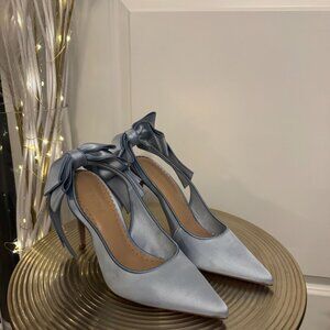 Steve Madden Teacup satin bow detail slingback stiletto pumps in blue.